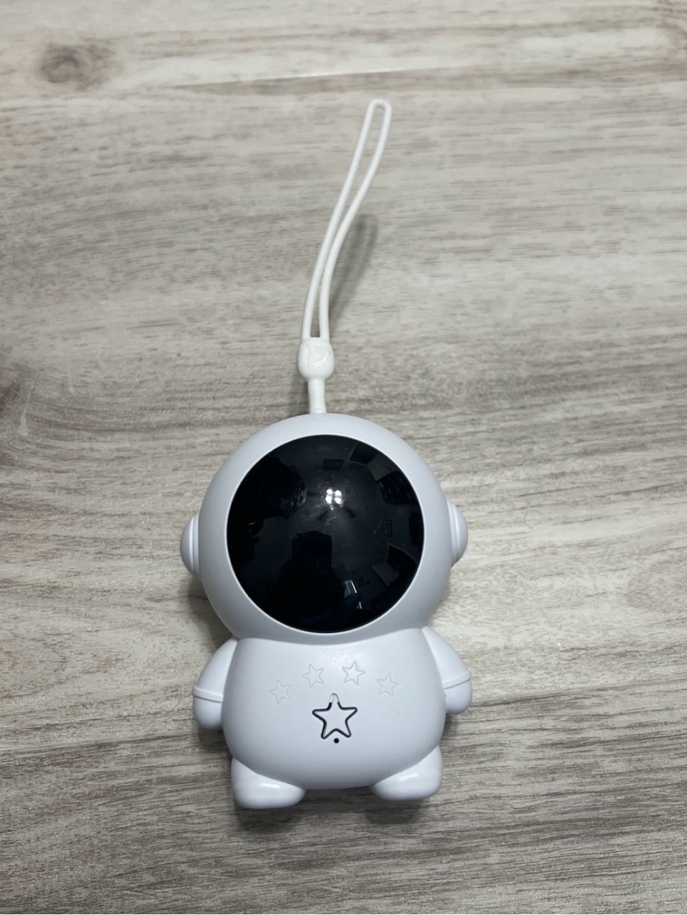 White Astronaut-Shaped hand warmer with Strap